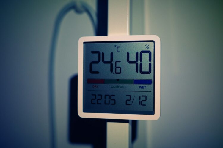 A digital thermometer on a door handle