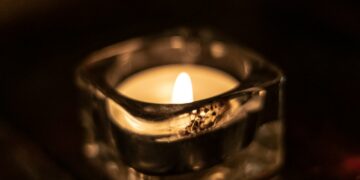 clear glass candle holder close-up photography