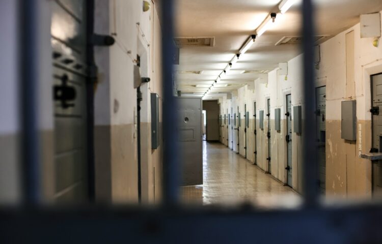 A long hallway with a bunch of lockers in it