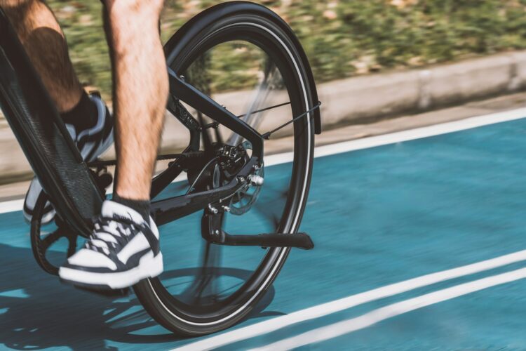 A close up of a person riding a bike