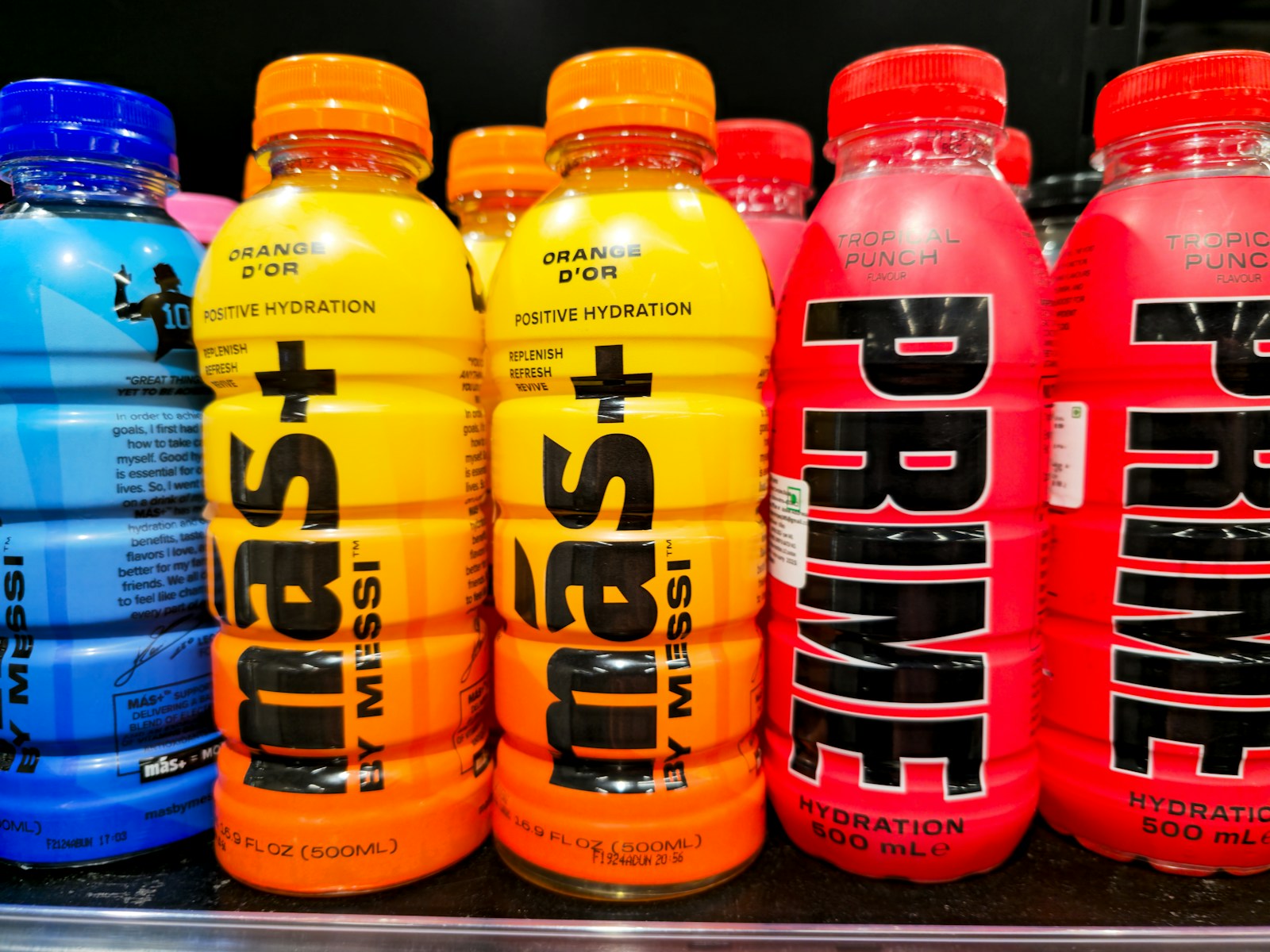 Bottles of prime and mas+ energy drinks