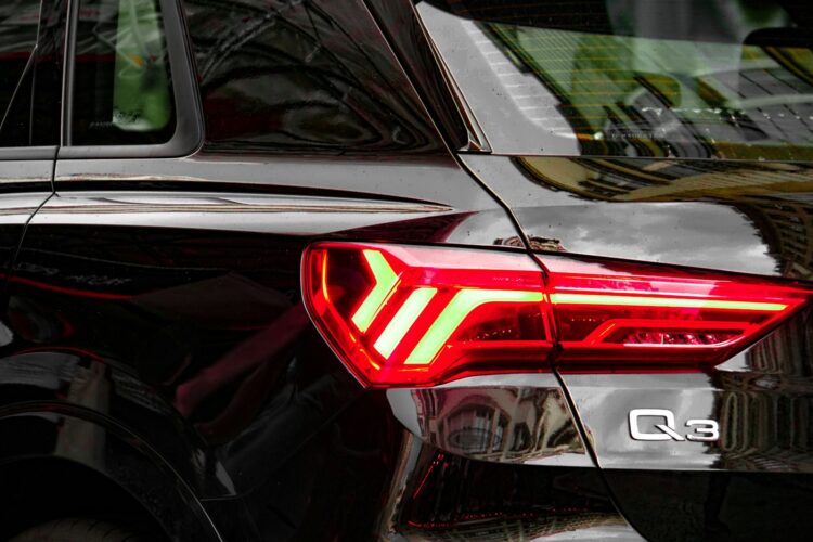A close up of the tail light of a car