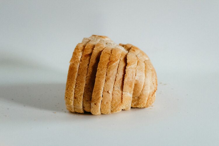 Sliced of bread on top of white surface