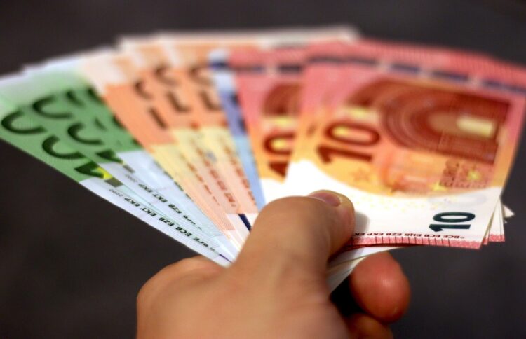 Money banknotes euro hand banknote currency paper money seem 50 euro 100 euro 10 euro 20 euro finance pay hand over business stack lots financial world cash funds money euro euro euro euro euro