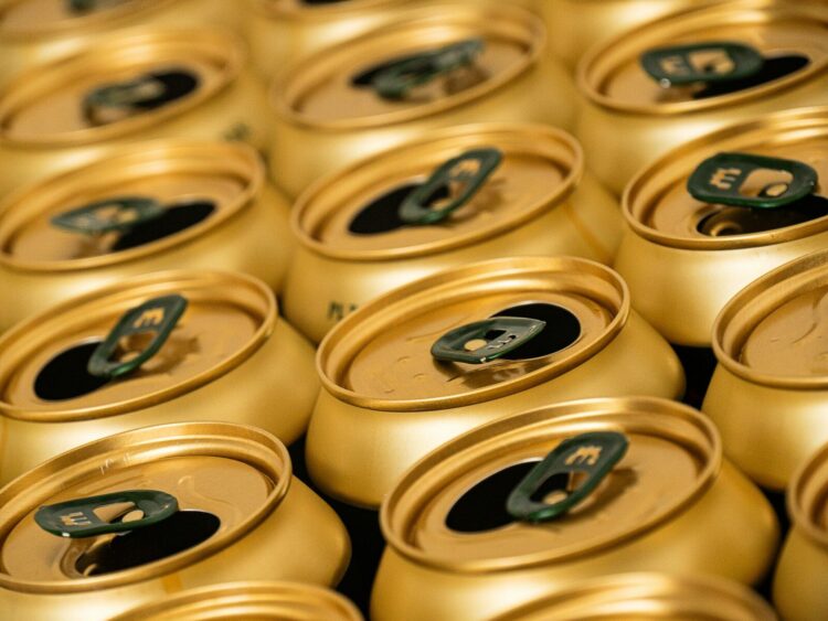 A close up of many cans of beer