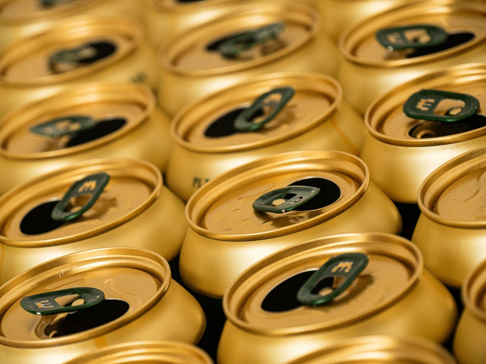 A close up of many cans of beer