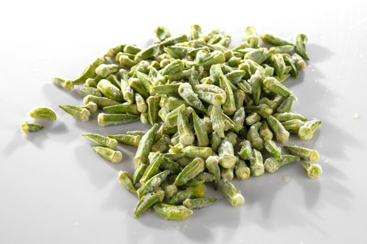 Green vegetable on white table