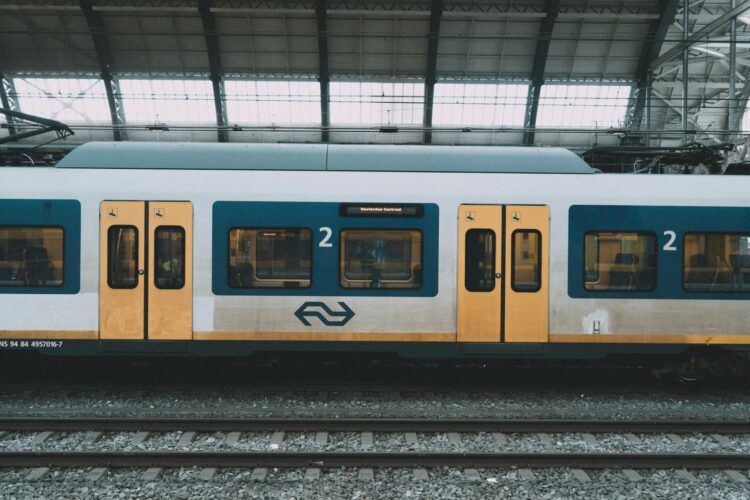 A train is waiting at a train station