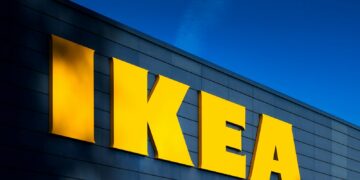a yellow ikea sign on the side of a building