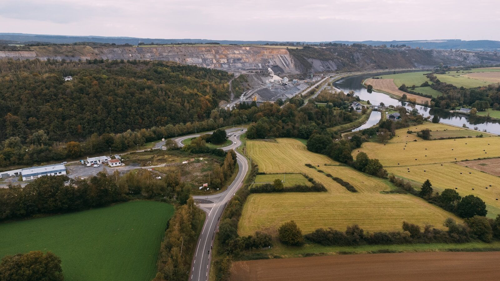 An aerial view of a rural area with a river running through it