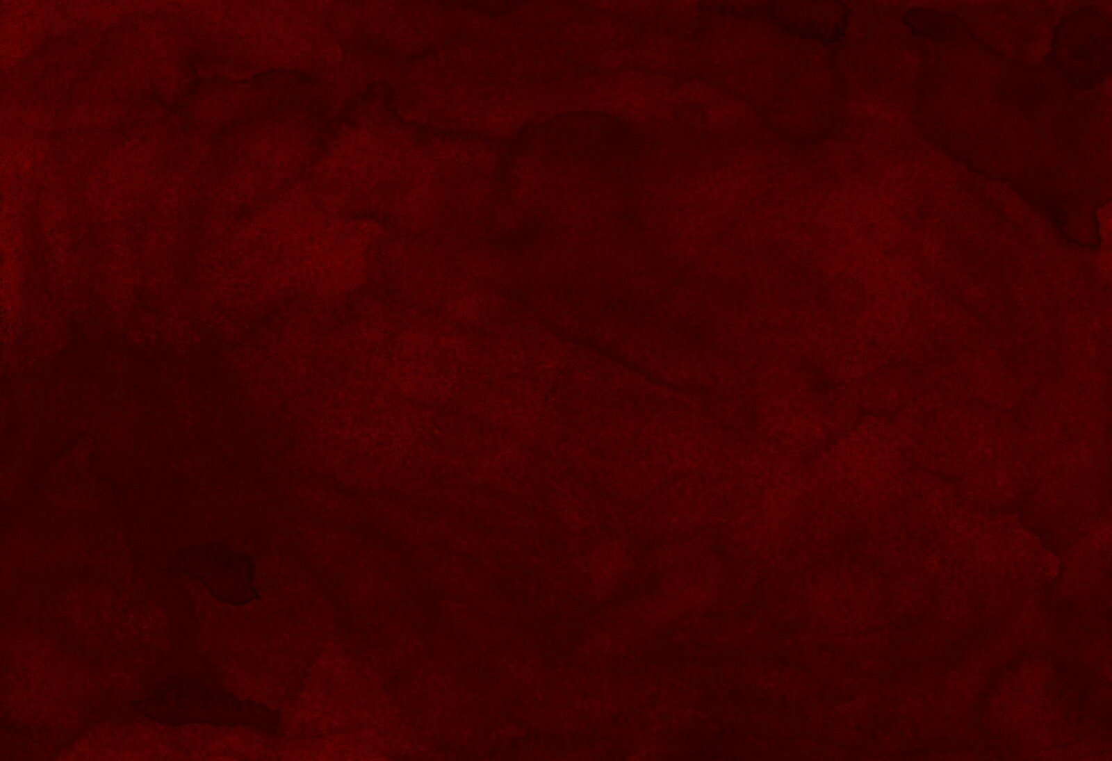 Red textile on brown wooden table