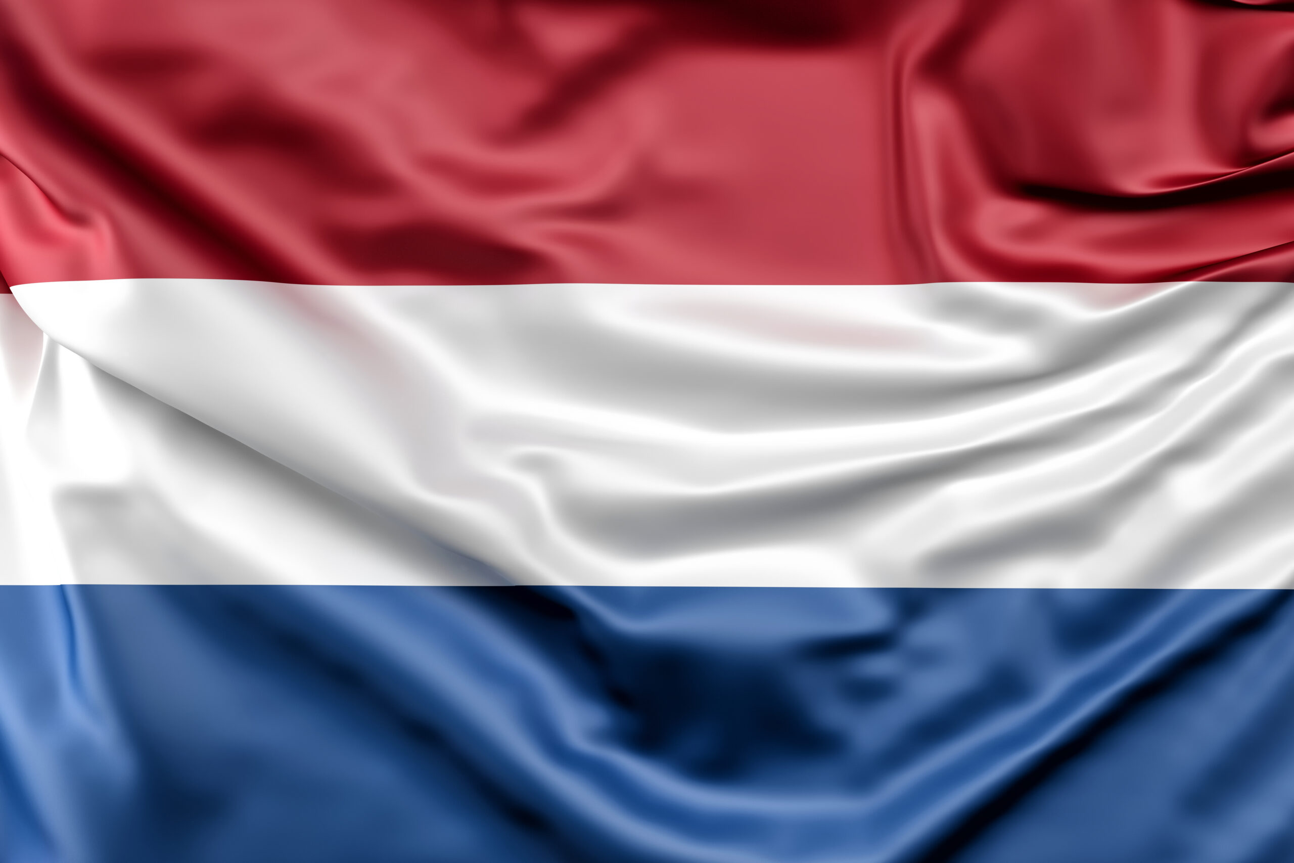 Waving flag of the netherlands with horizontal red white and blue stripes on fabric