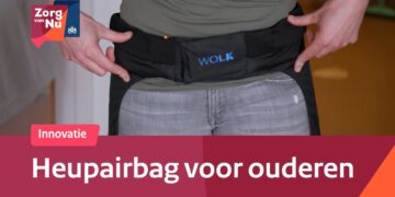 Promotional image of a hip airbag belt for seniors, worn around the hips with a blue 'WOLK' logo, plus 'Innovatie' banner and Dutch title 'Heupairbag voor ouderen' (Zorg van Nu branding).