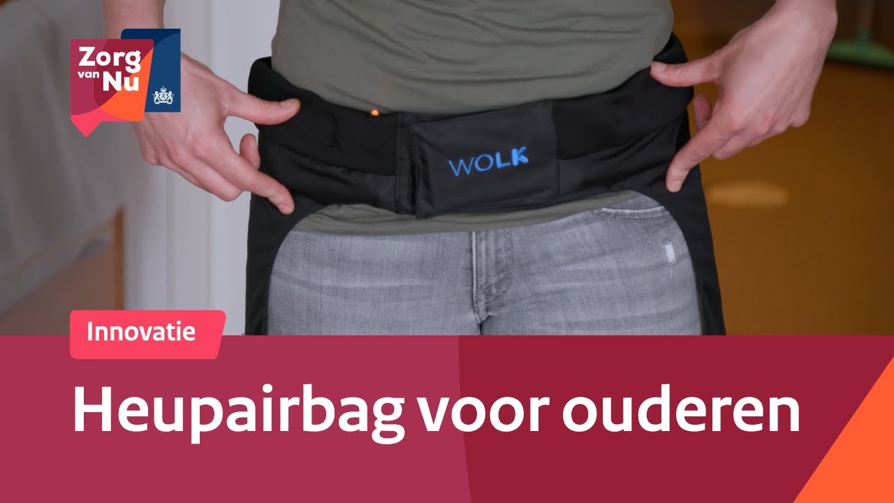 Promotional image of a hip airbag belt for seniors, worn around the hips with a blue 'WOLK' logo, plus 'Innovatie' banner and Dutch title 'Heupairbag voor ouderen' (Zorg van Nu branding).