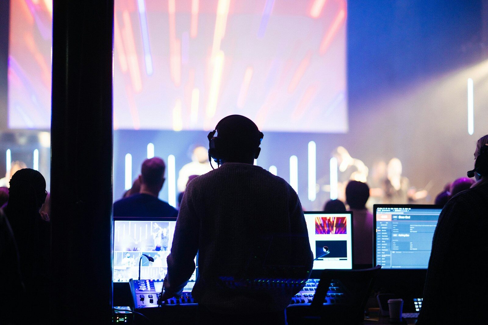 A sound engineer operates during a performance.
