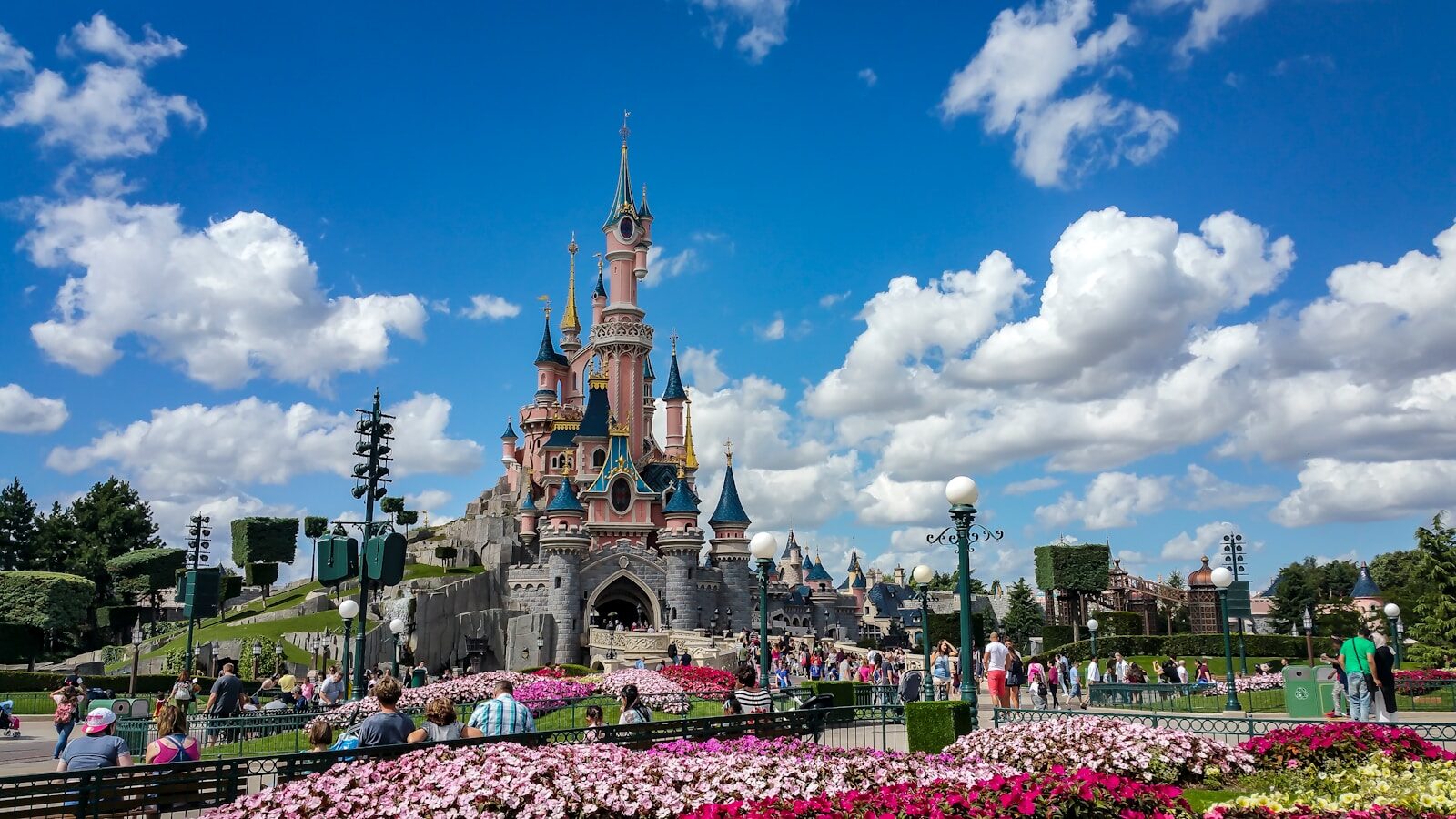 a castle with a lot of people around it