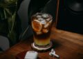 a glass of beer on a table