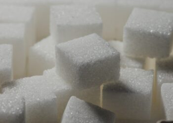 a pile of sugar cubes sitting on top of each other