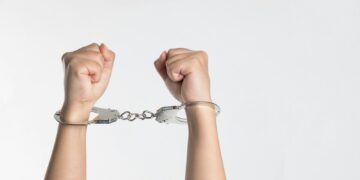 person showing handcuff